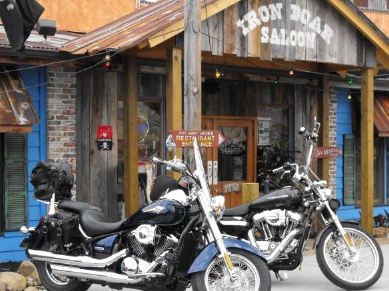 motorcycles parked outside Iron Boar Saloon