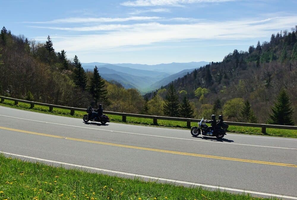 two motorcycles on mountain road